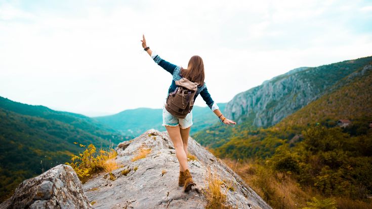 hippie woman stroll on mountain